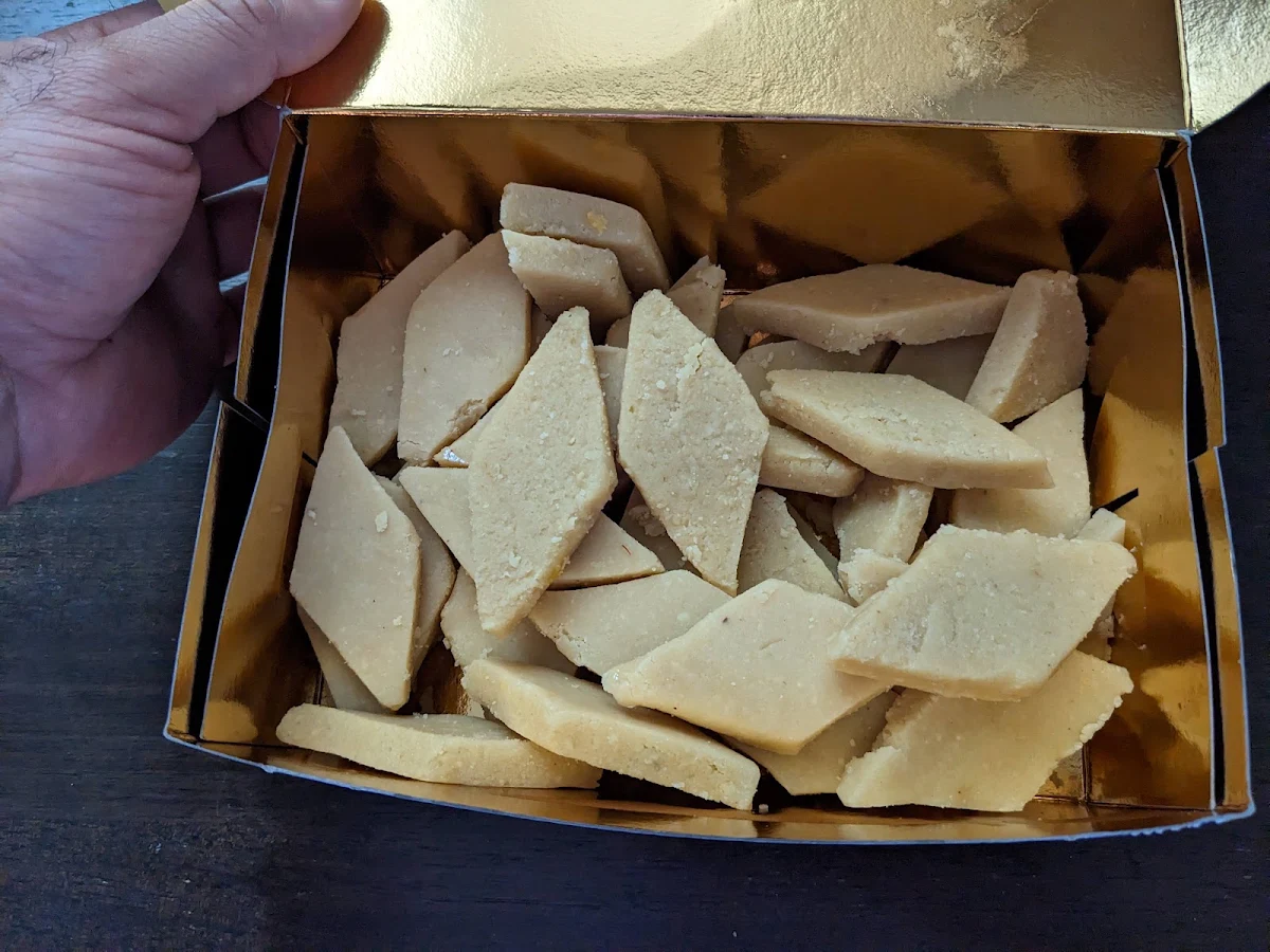 Old Dried Badly Cut Kajoo Burfi, Sanjha Punjab Sweethouse Ltd