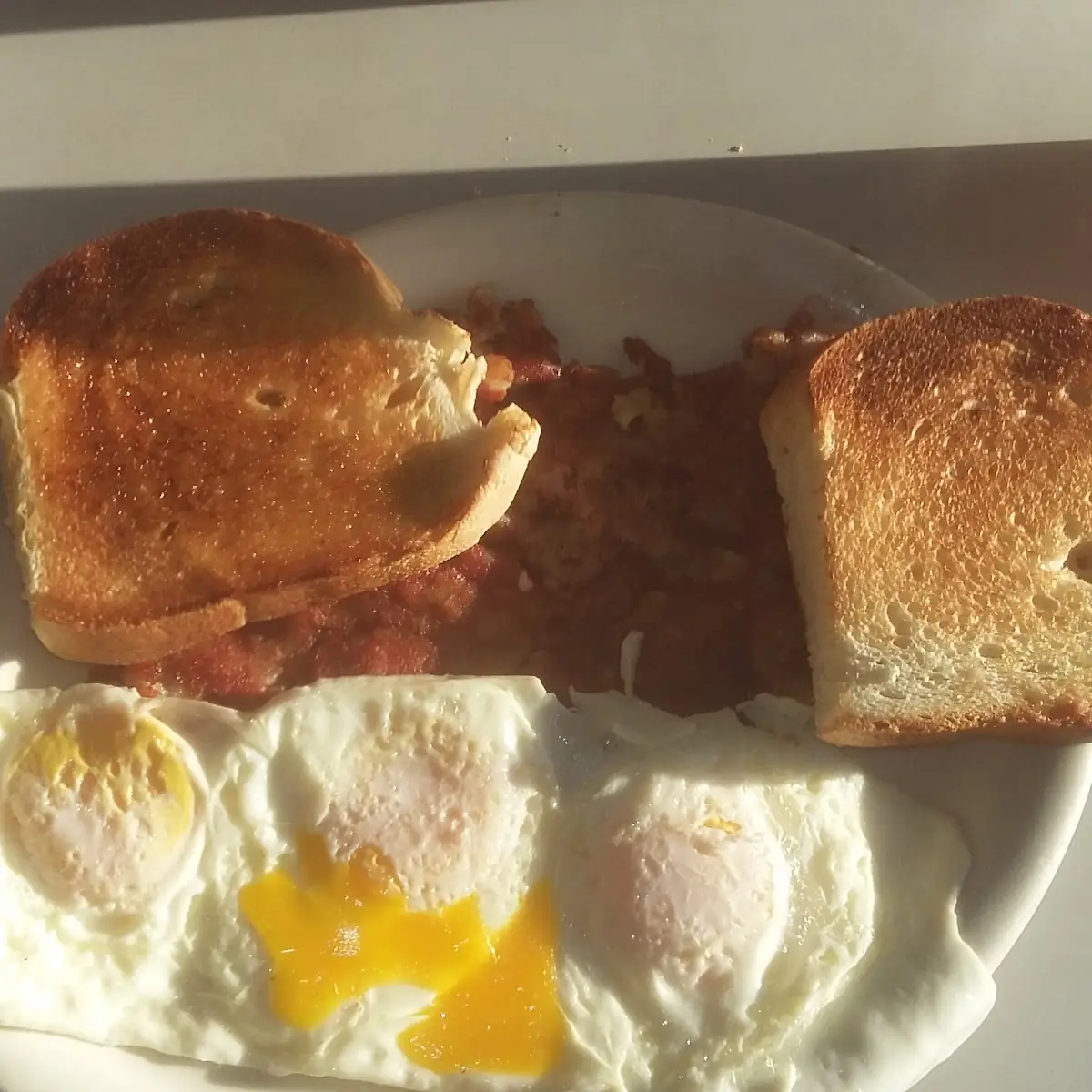 Eggs Hash Browns and Toast