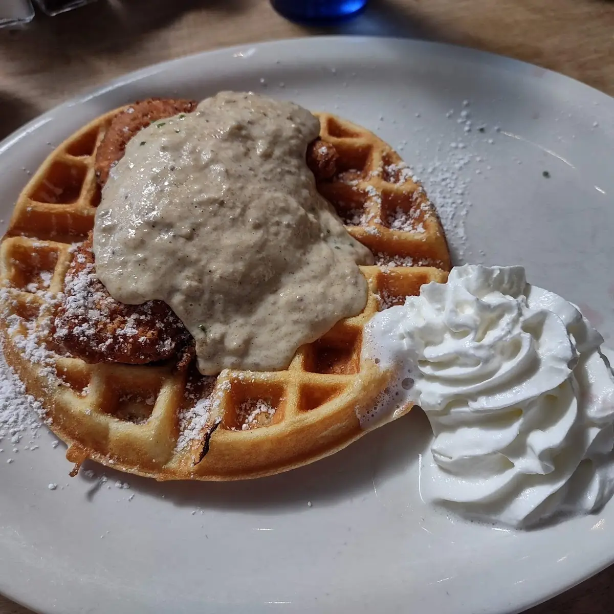 Waffle w Chicken Braised & Fried Scrapple Gravy Maple Syrup