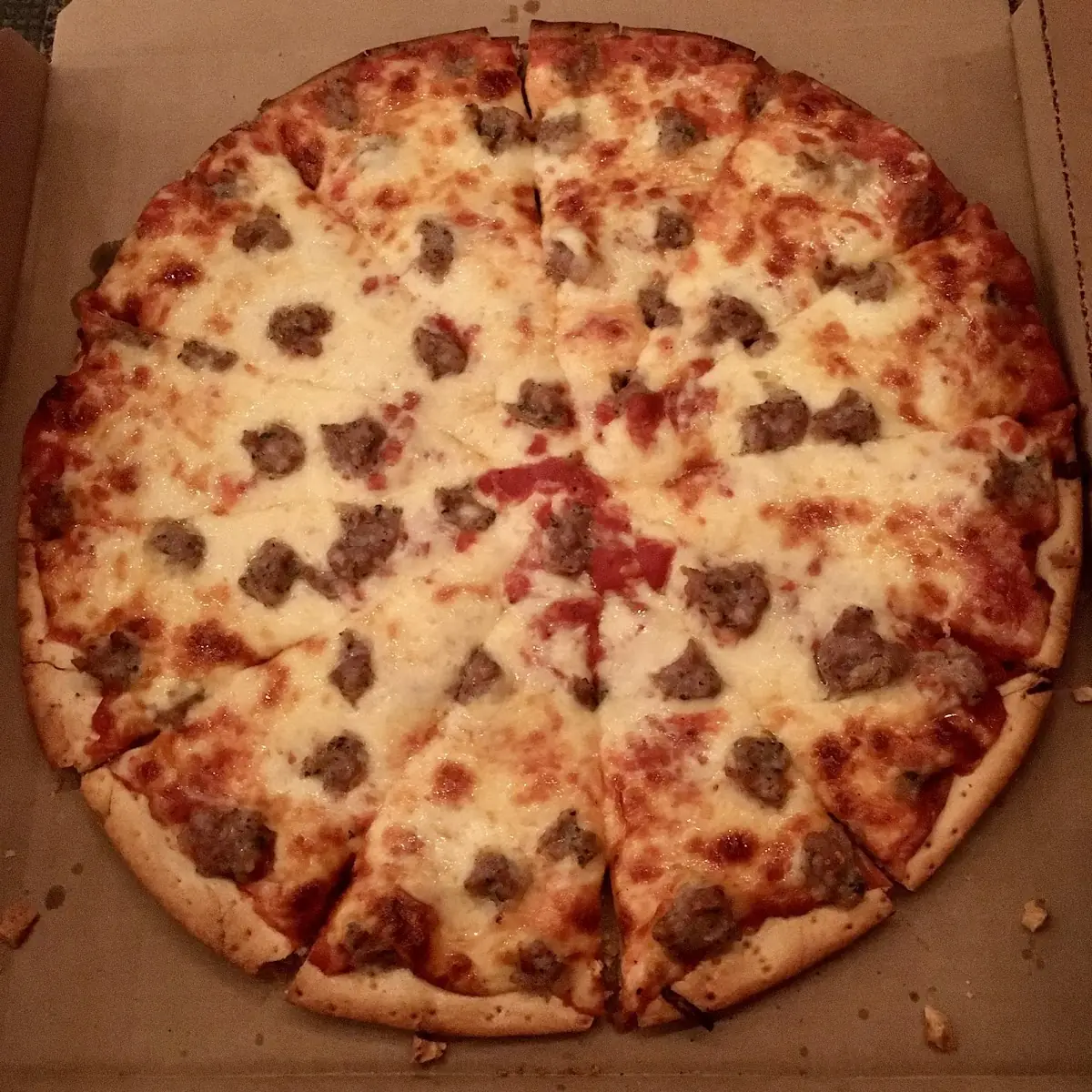 Thin Crust Cheese and Sausage Pizza