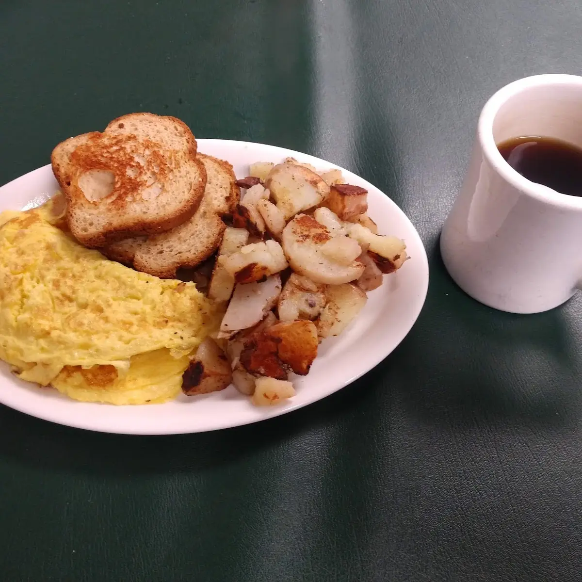 Biscuits and Sausage Gravy with Eggs over Easy