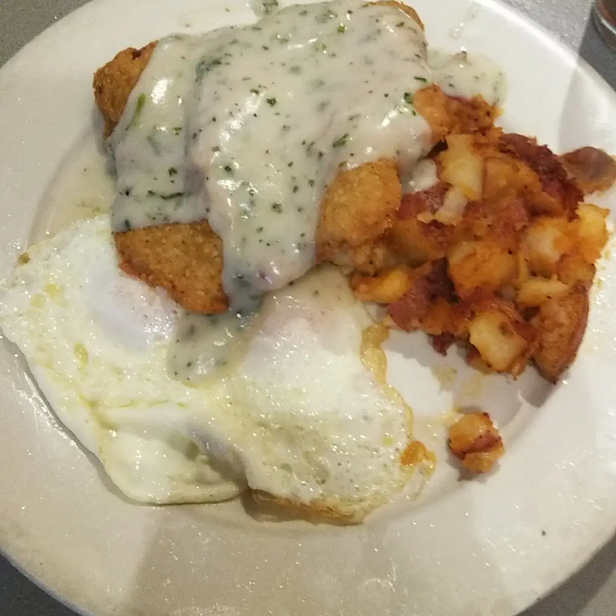 Chicken Fried Steak and Eggs over Easy with Hash Browns