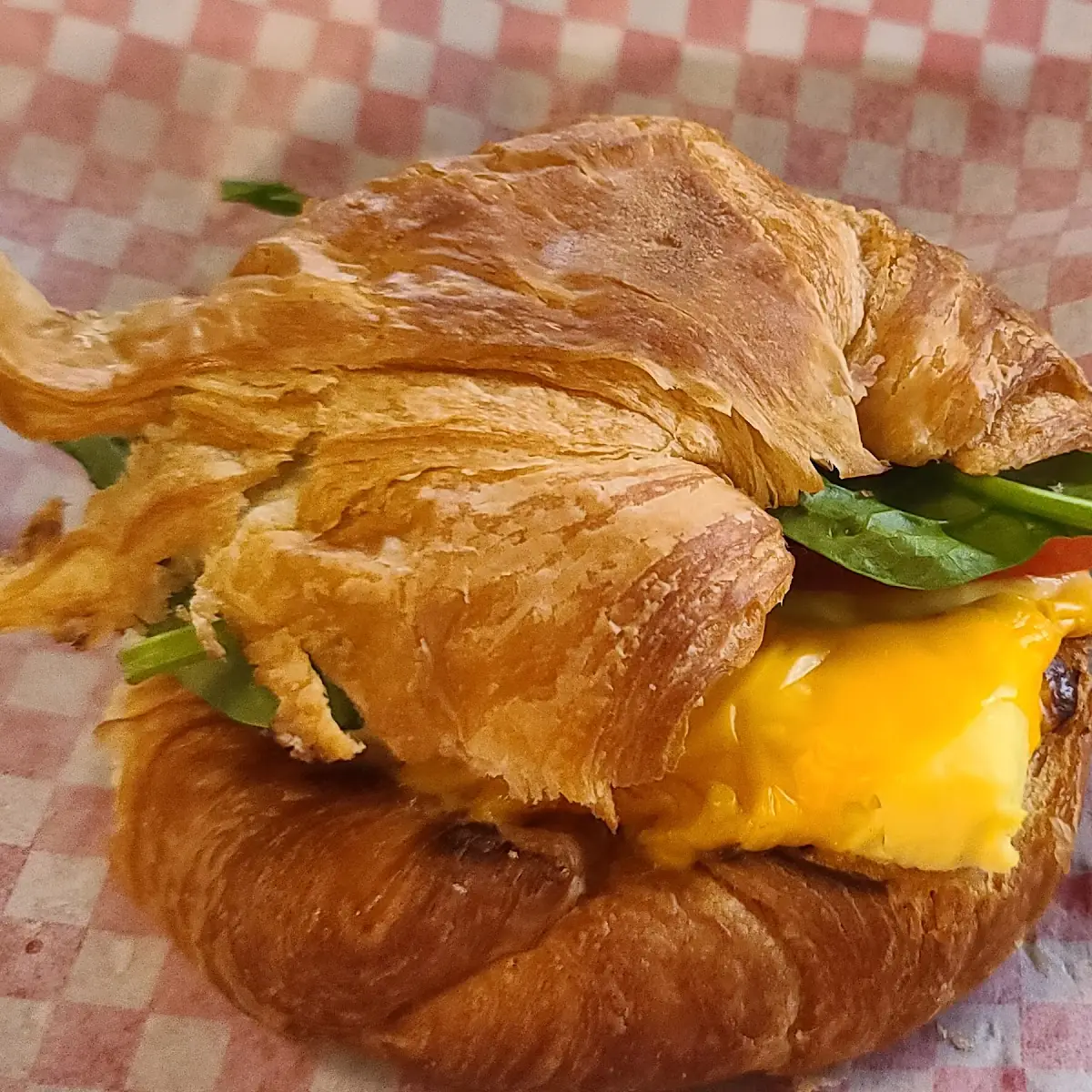 Egg & Cheese Croissant with Added Tomato and Spinach