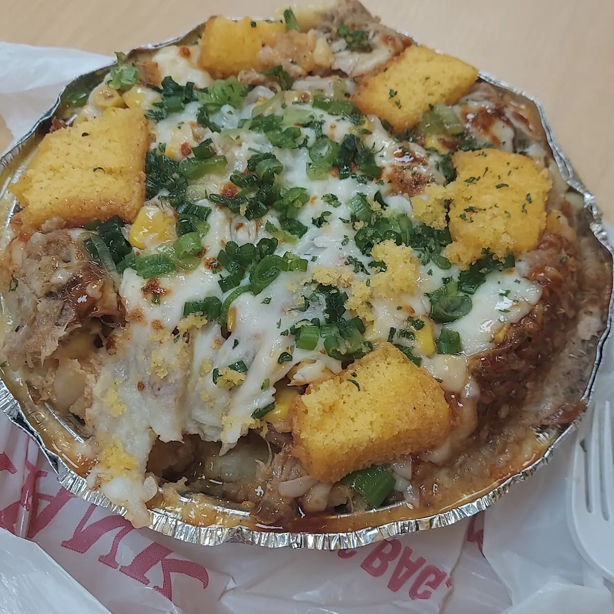 Baked Potato with Mac N Cheese Pulled Pork and Cornbread