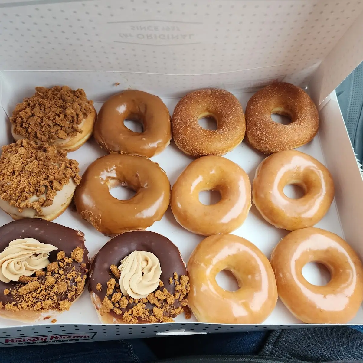 4 Original Glazed 2 Biscoff Glazed 2 Cinnamon Sugar Donuts 2 Chocolate Iced Cookie Butter Crunch