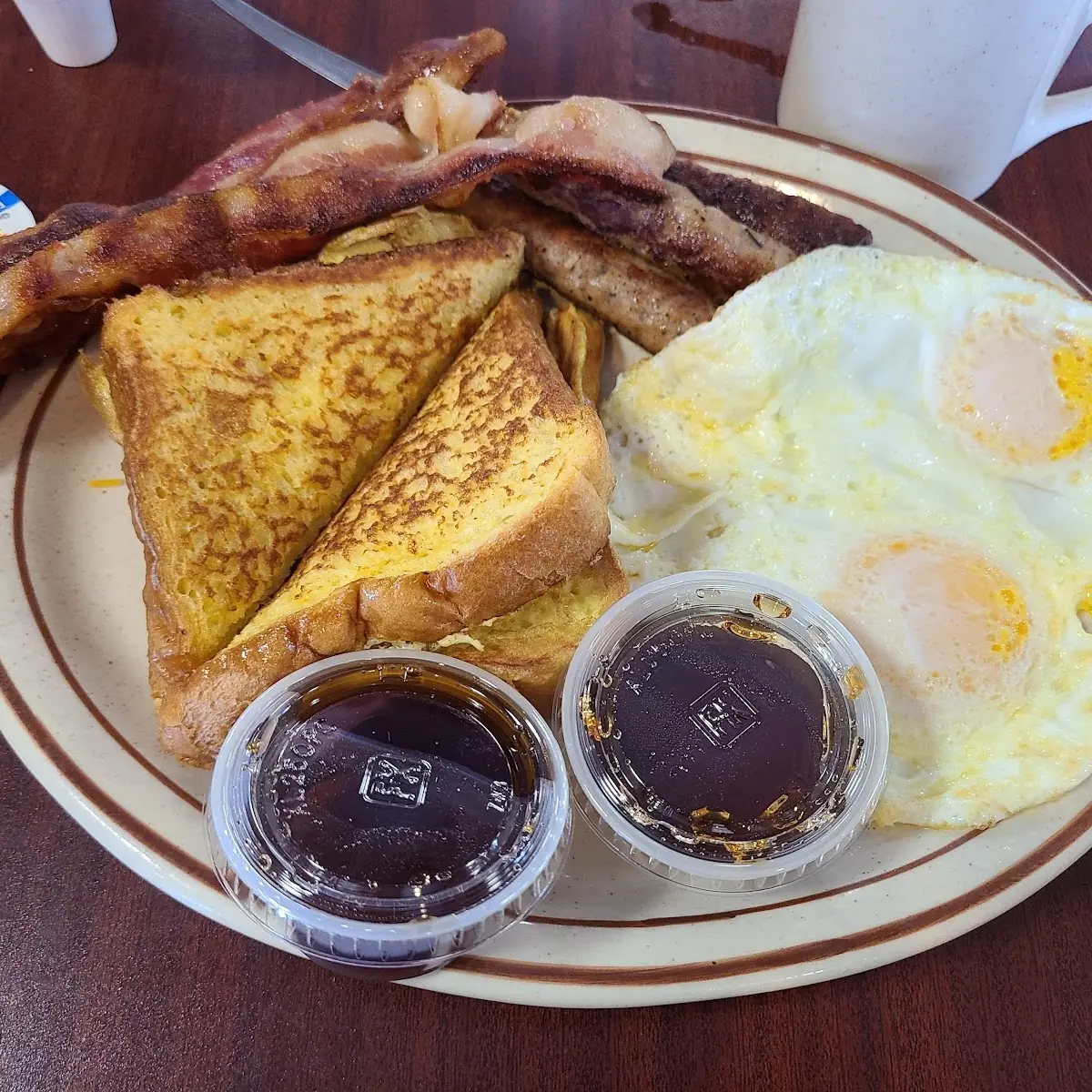 Eggs Bacon Hashbrowns and White Toast