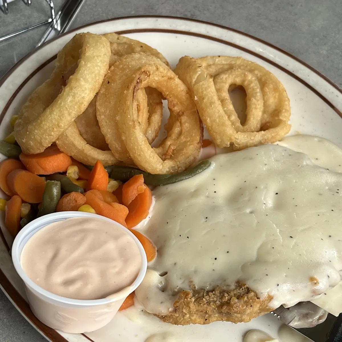 Chicken Fried Steak with Gravy and Onion Rings