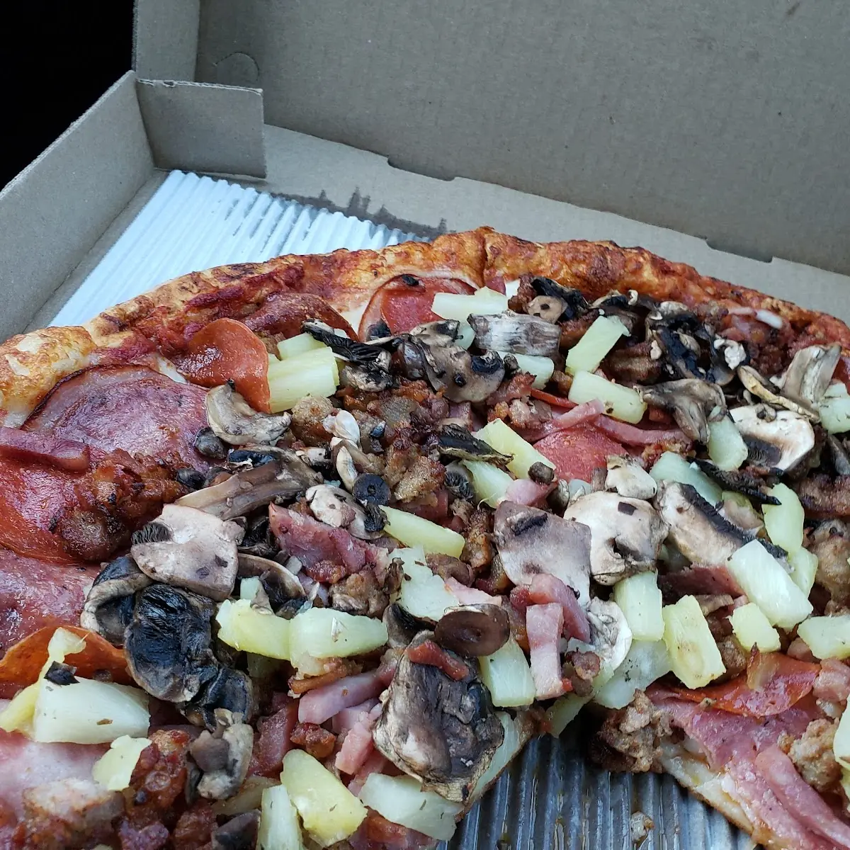 Meat Lovers with Mushrooms and Pineapple Added