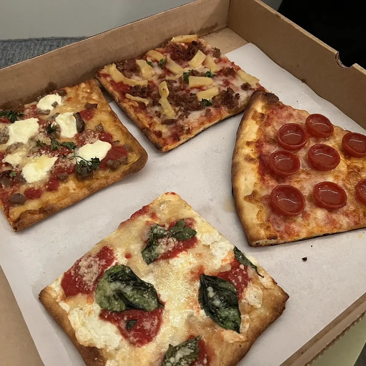 Assorted Pizza Slices in Box
