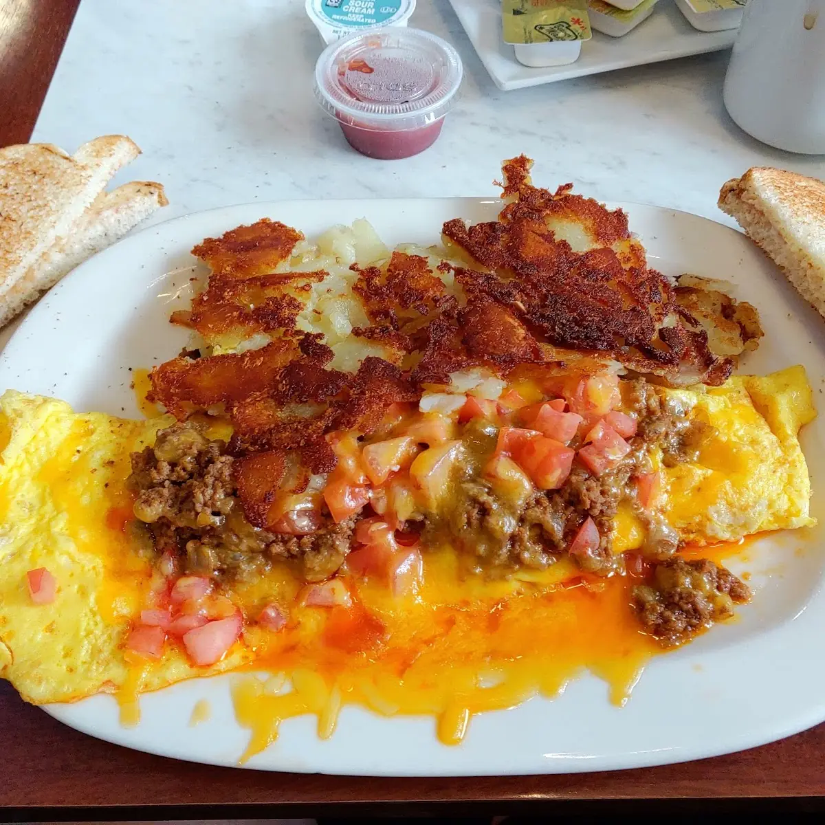 Corned Beef Hash & Swiss Omlet