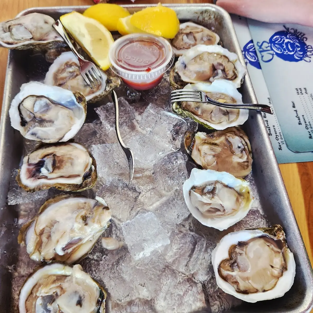 Raw Oysters with Lemon Wedges