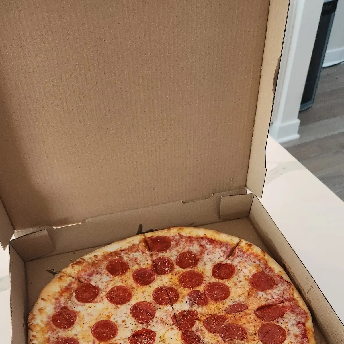 Pepperoni Pizza in Cardboard Box