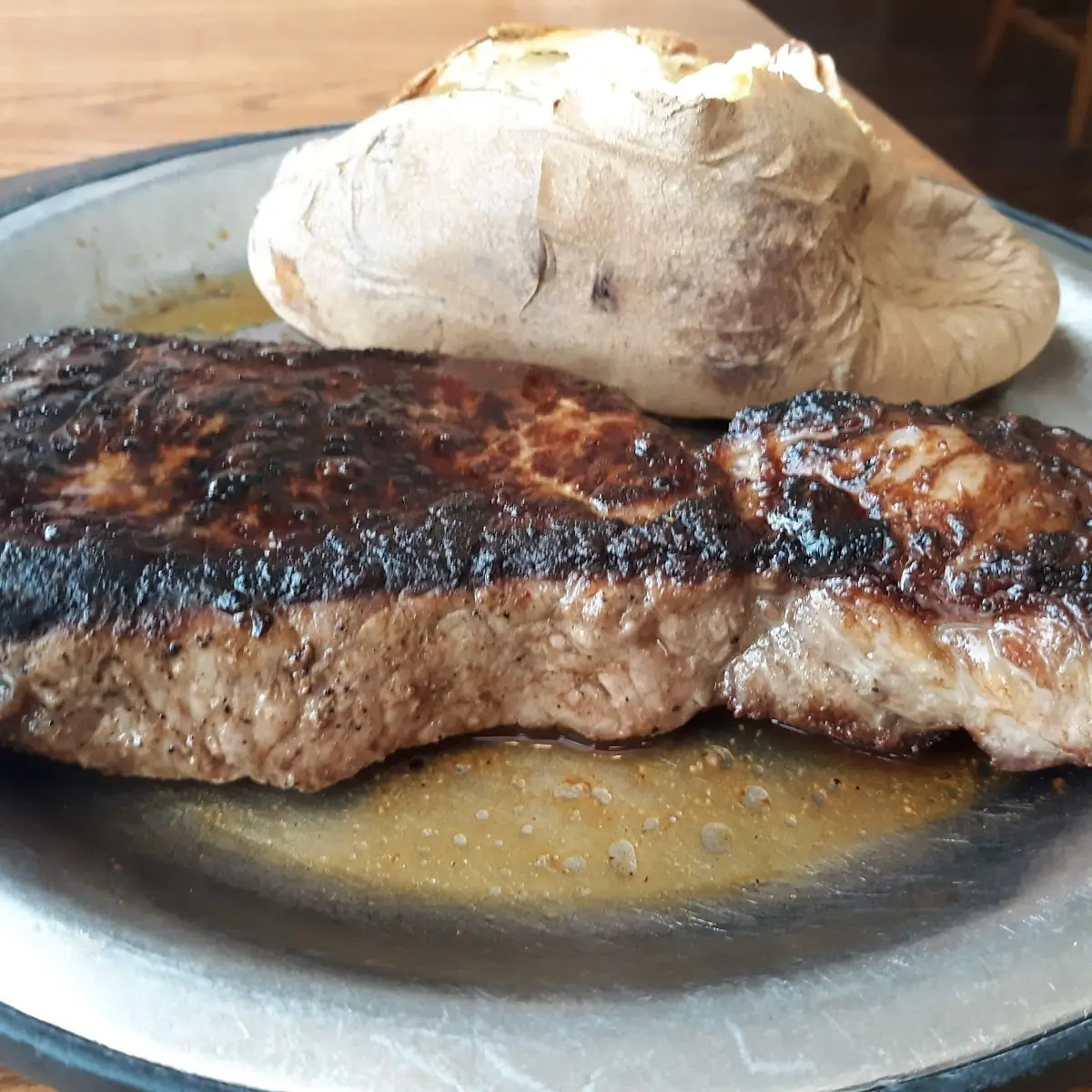 New York Strip Steak Medium Well with Baked Potato