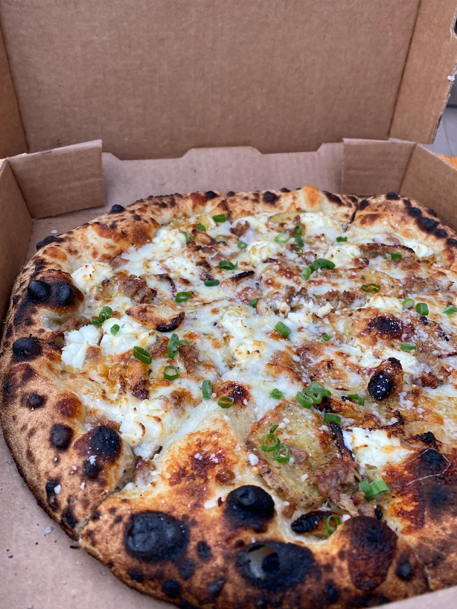Wood Fired Sausage Pizza Slice