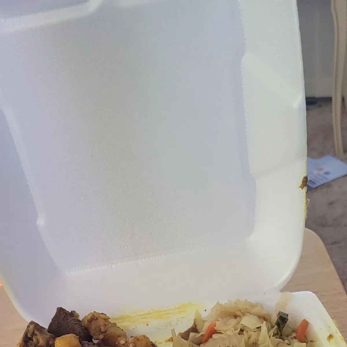 Curry Goat with Rice and Beans and Cabbage