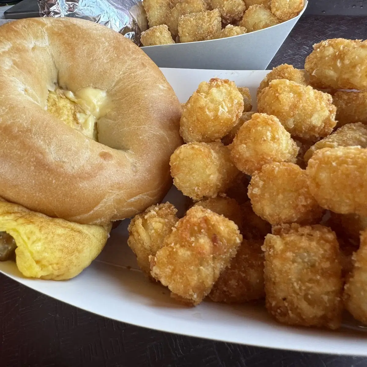 Sausage Egg and Cheddar Bagel Sandwich