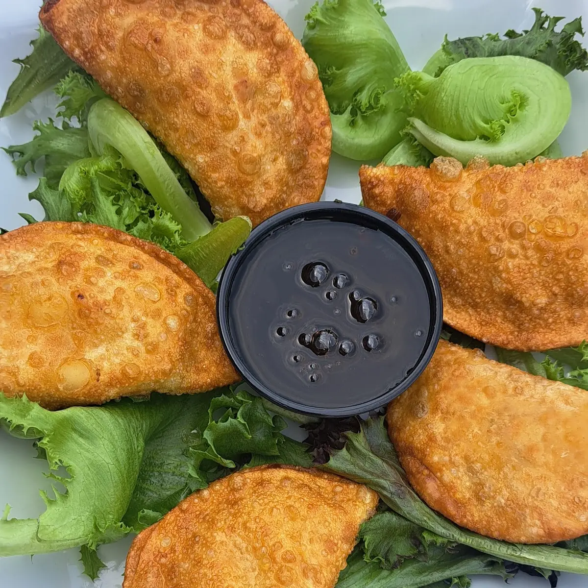 Duck Bacon Sweet Corn Wontons w Citrus Sauce