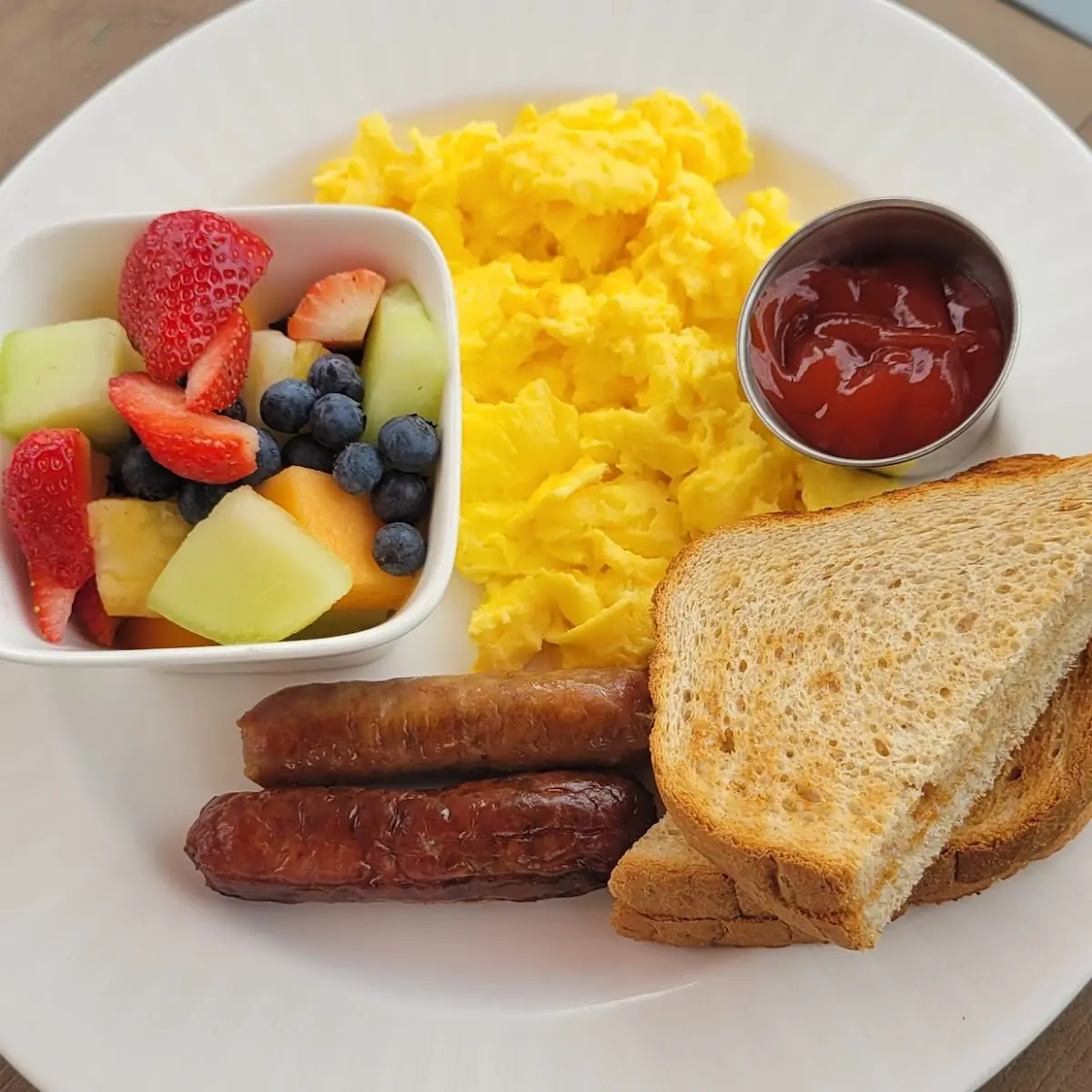 2 Eggs Sausage Toast & Fruit Cup