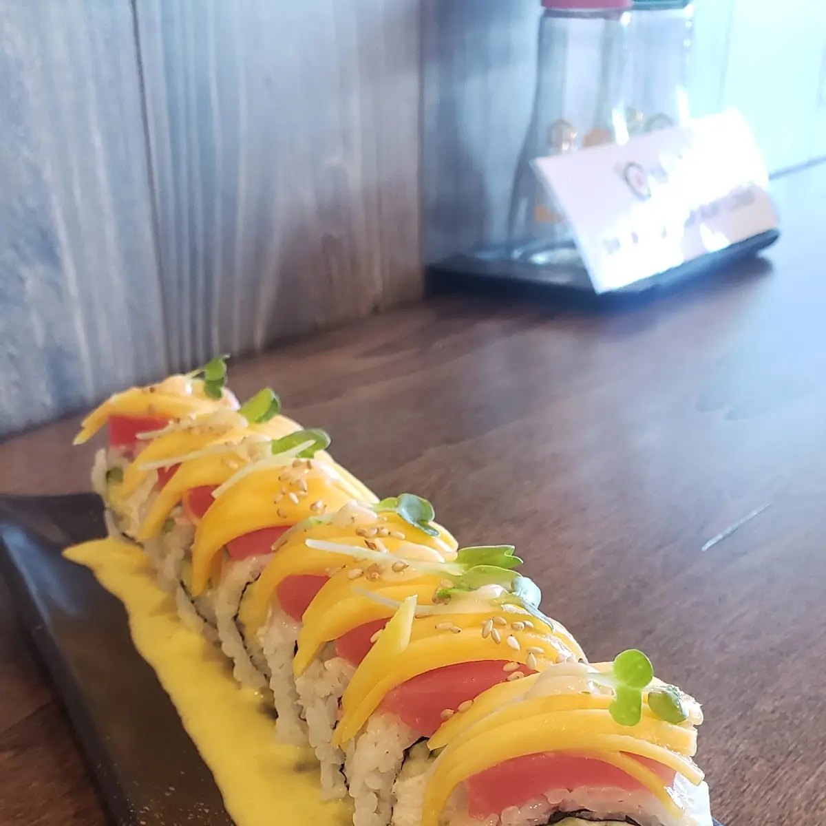Feeling the Summer Heat Try Our Tropical Roll with Mango Tuna and Out Mango Sauce