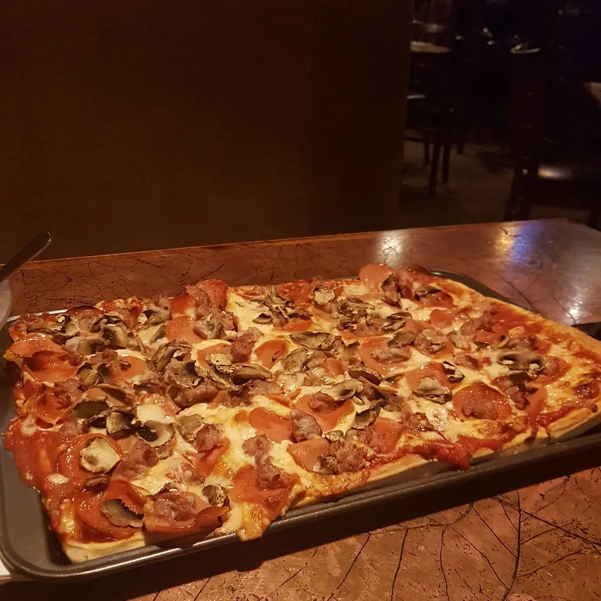 Deluxe Pizza Pepperoni Mushroom Sausage Medium Size 15 Slices, Aurora's Westside