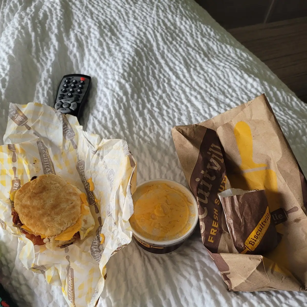 Bacon Egg and Cheese Biscuit Sandwich with Grits