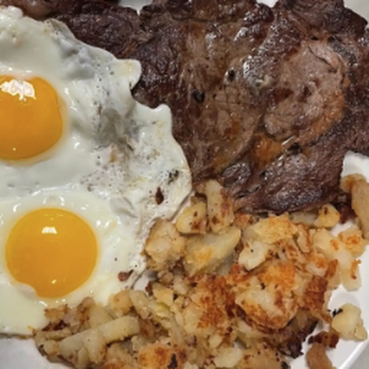 Rib Eye Steak 8oz and Eggs