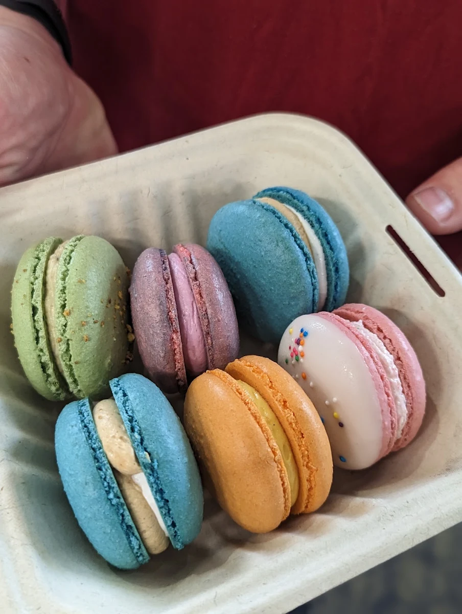 L-R T-B Ube Cookies & Cream S'Mores Bomb Pop x2 White Chocolate Raspberry Macarons