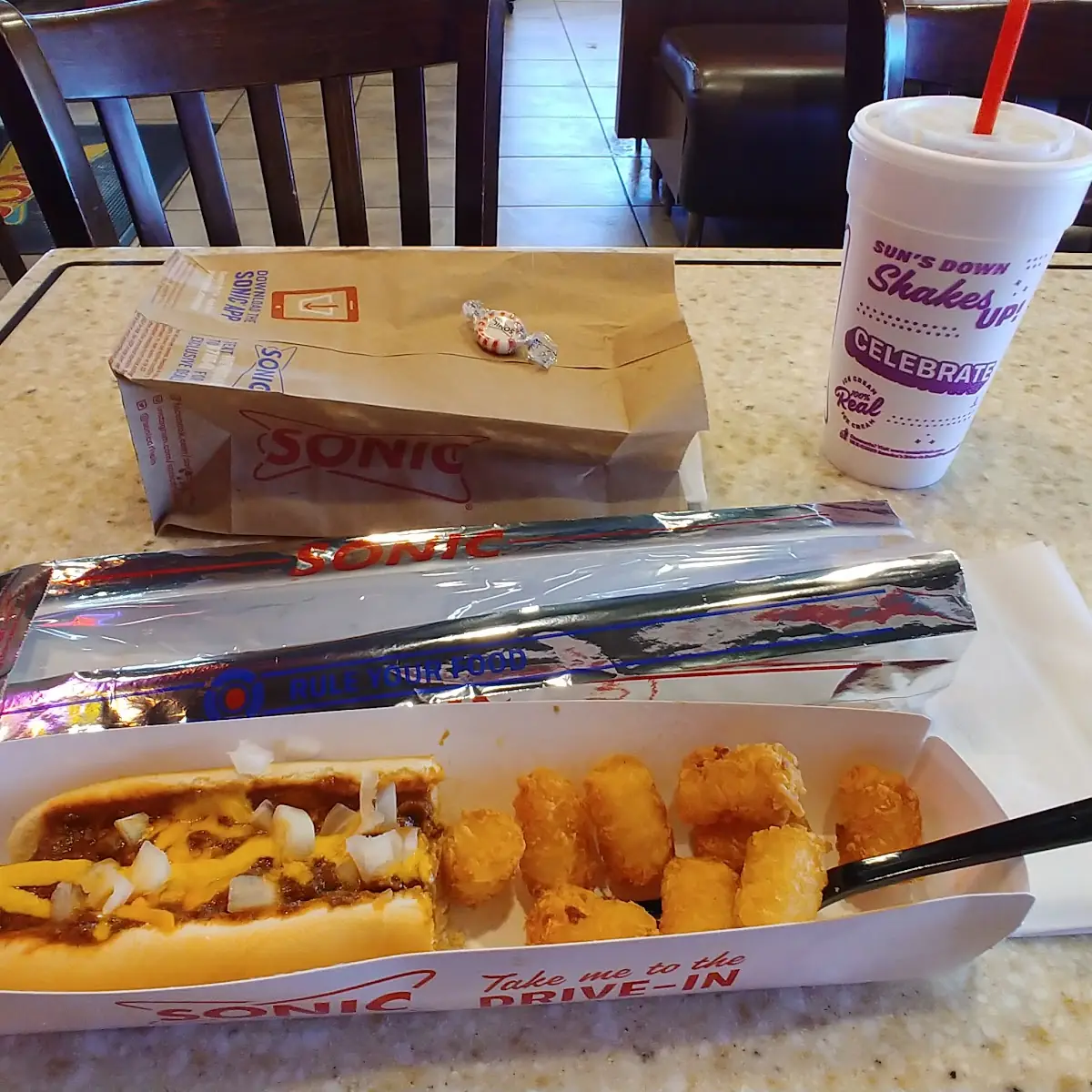 Foot Long Cheese Conie with Tots and a Root Beer