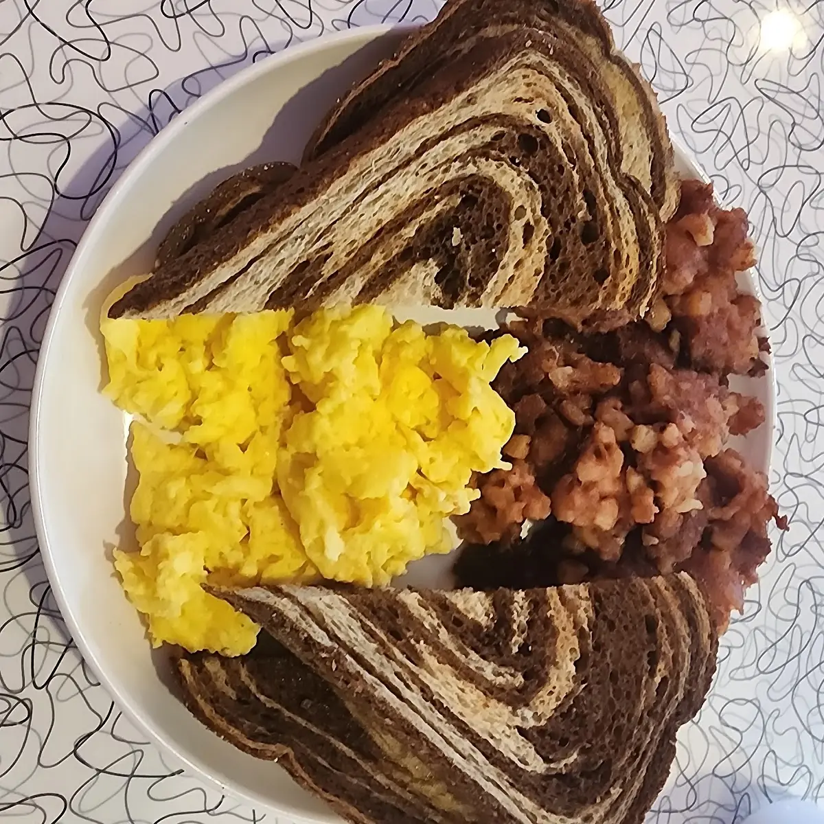 Corned Beef Hash with Scrambled Eggs and Rye Toast