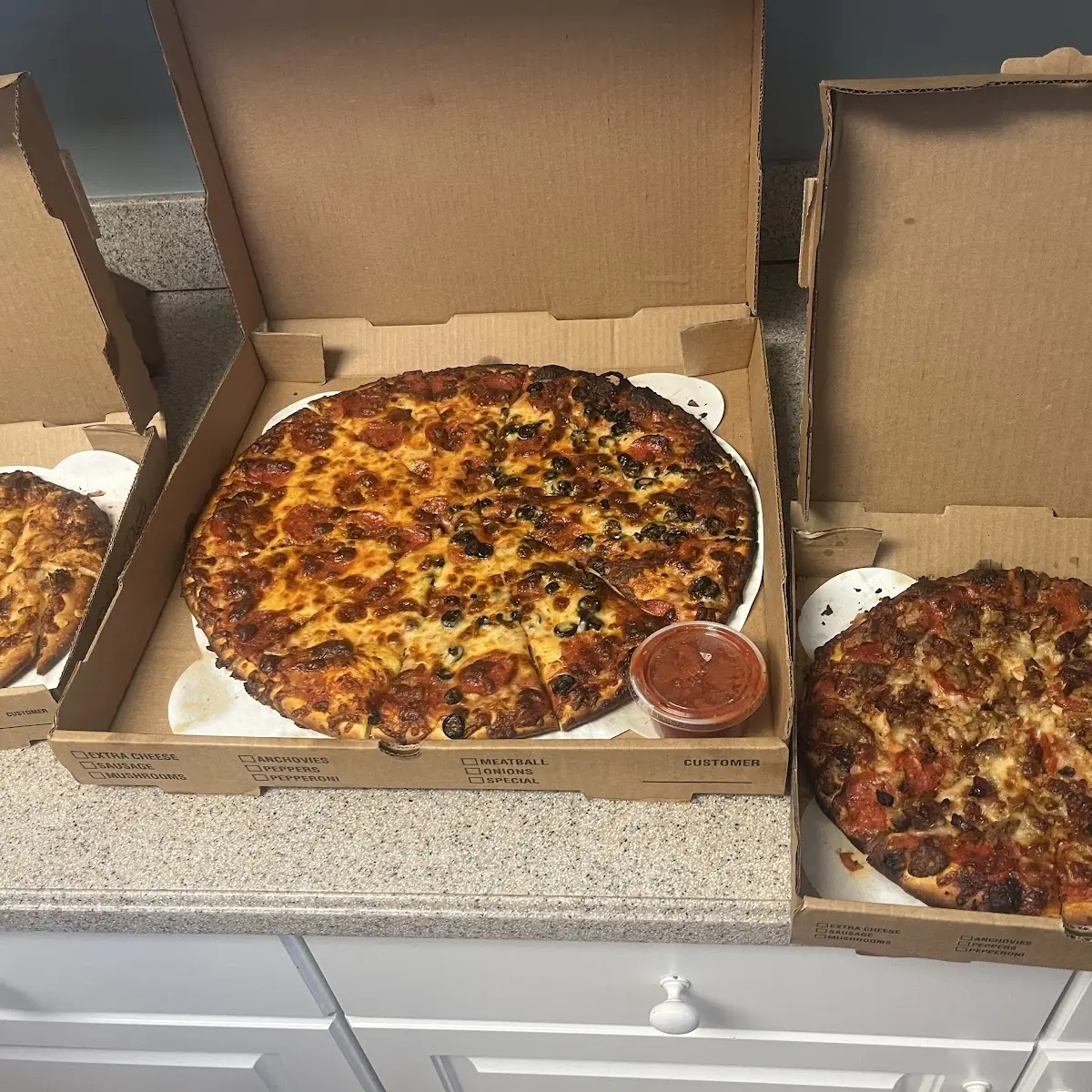 Sausage Pizza in Cardboard Box