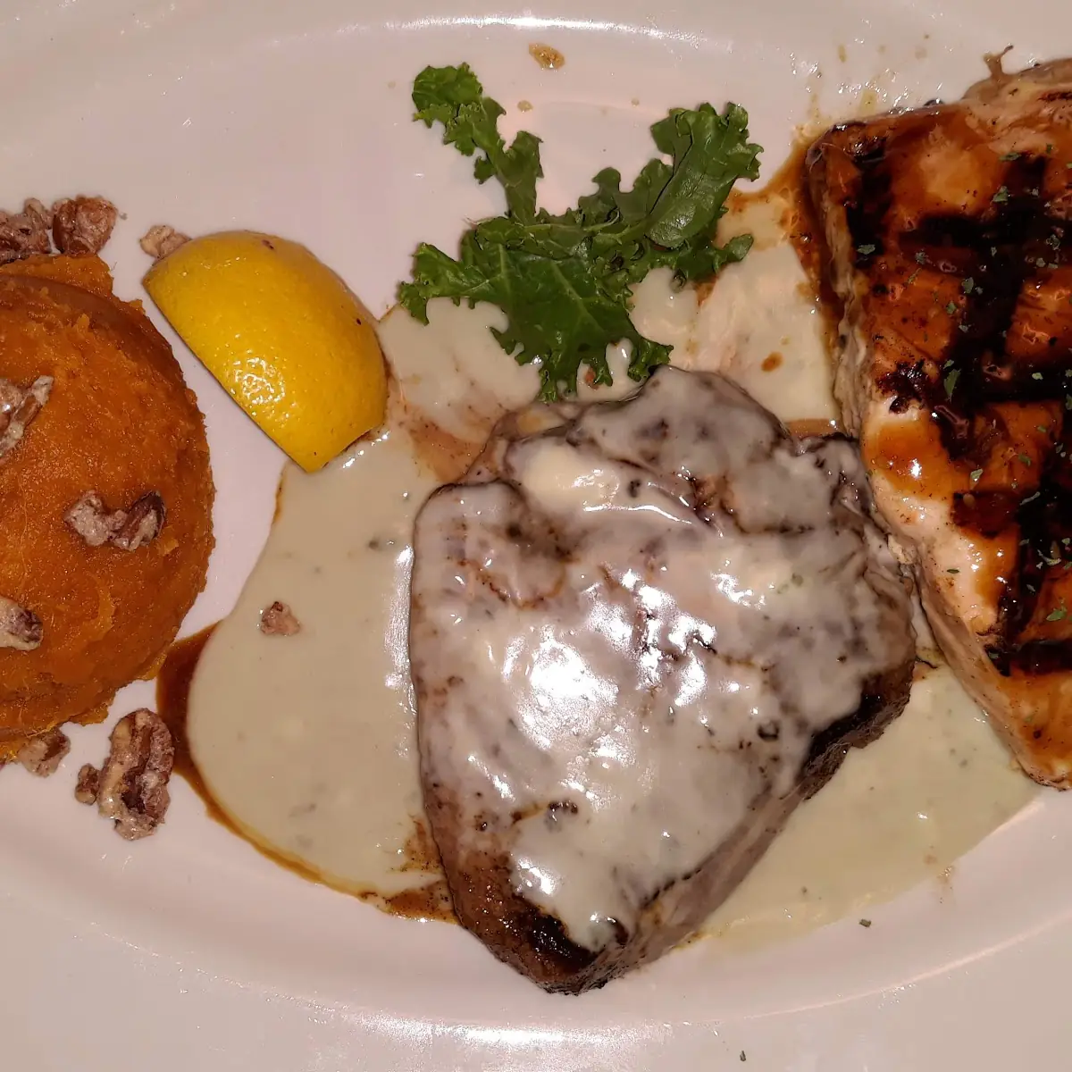 Blue Cheese Covered Filet Migon and Sslmon