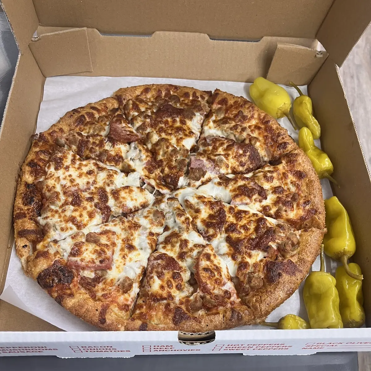 Thin Crust Meat Lovers Pizza
