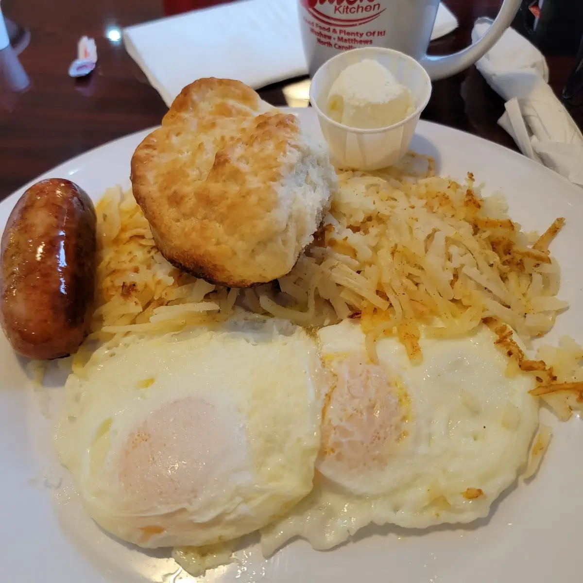 Eggs with Sausage Link Hash Browns Biscuit