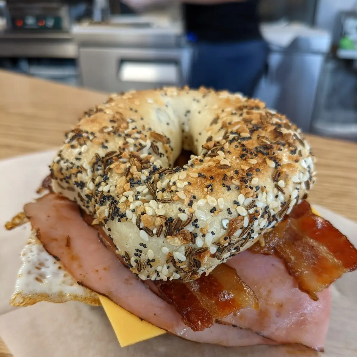 Bacon Egg Ham and Cheese on Everything Bagel