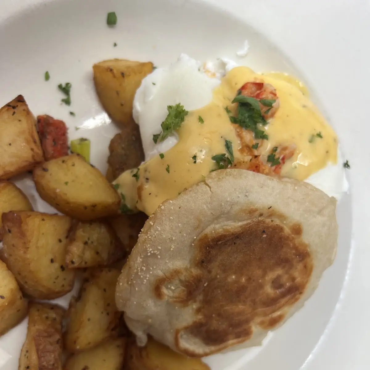 All Eggs Benedict Served with Home Fries