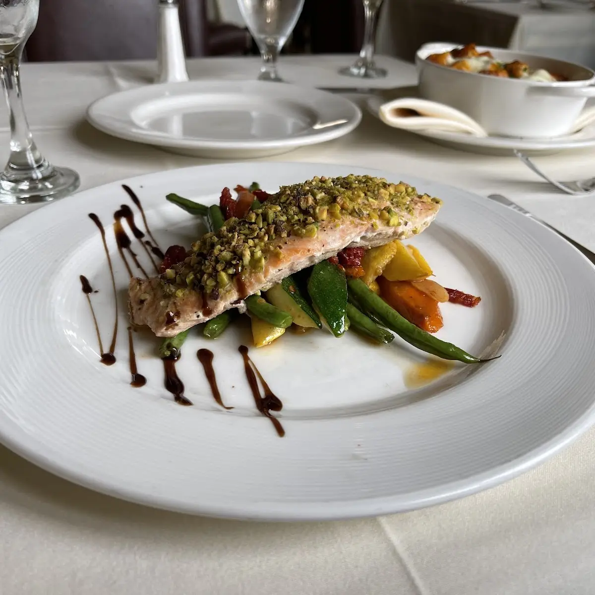 Pan Seared 8 Oz Filet of Mediterrenean Branzino Roasted Root Vegetables Salsa Verde