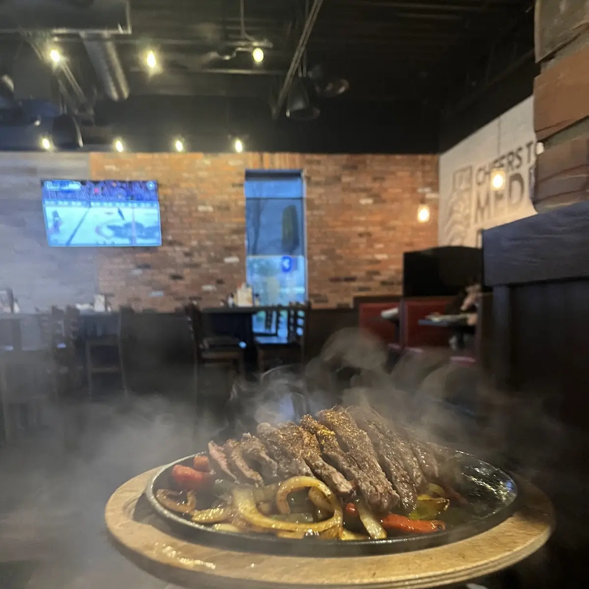 Sizzlin' Fajitas, Crabby Joe's Bar • Grill