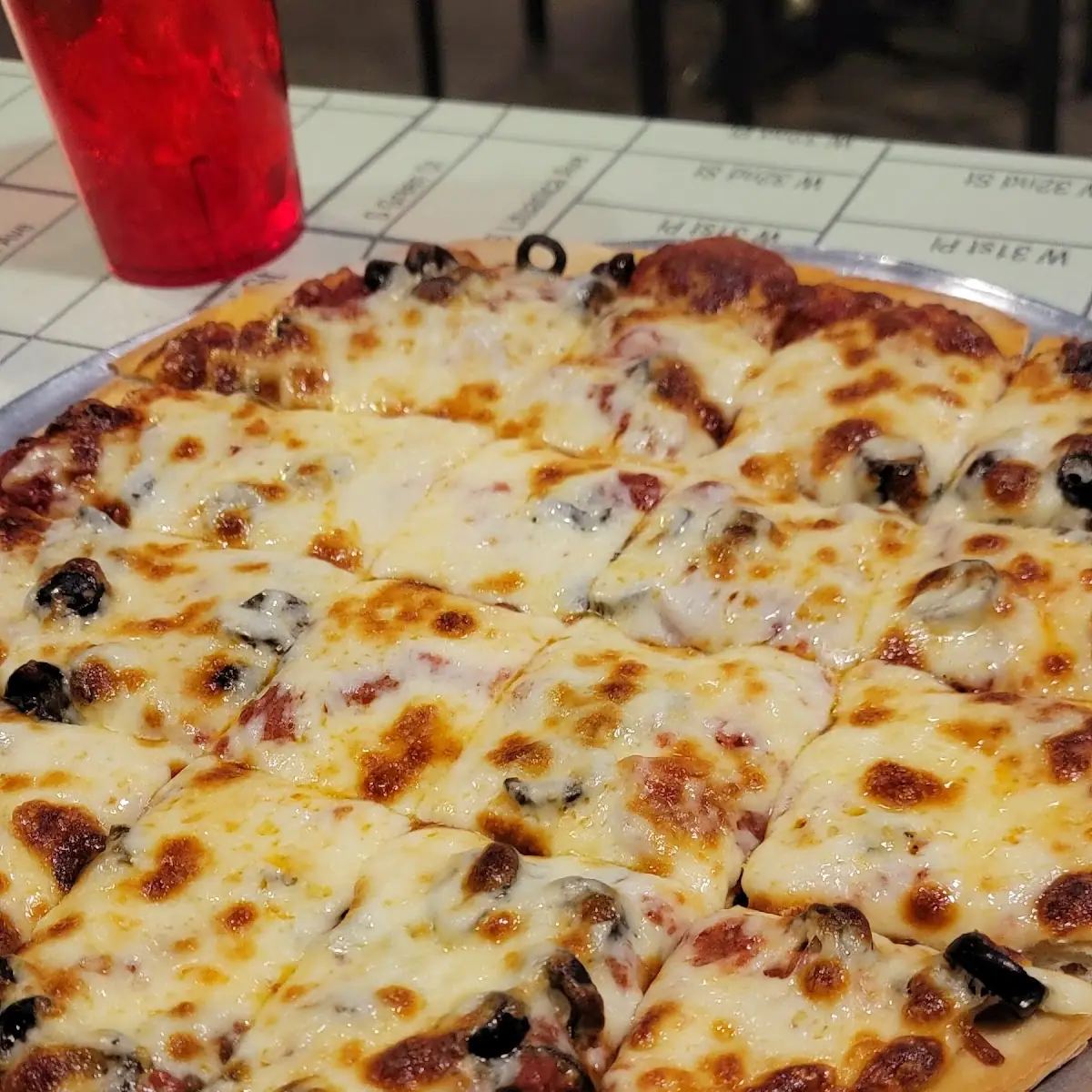 Medium Thin Crust Pepperoni and Black Oliveves