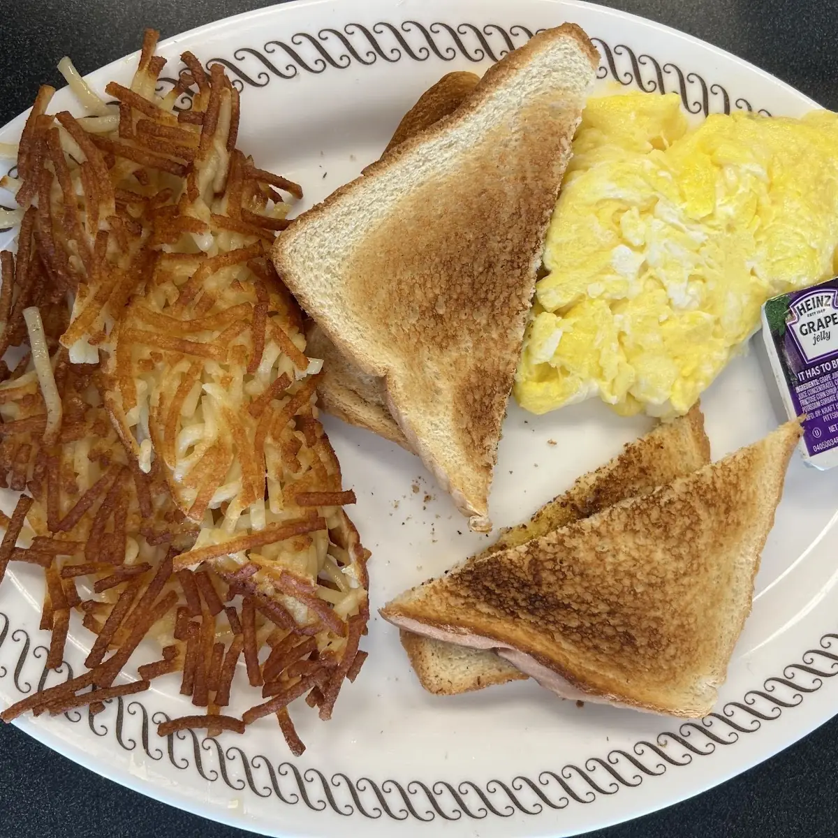 Scrambled Eggs and Toast with Hash Browns