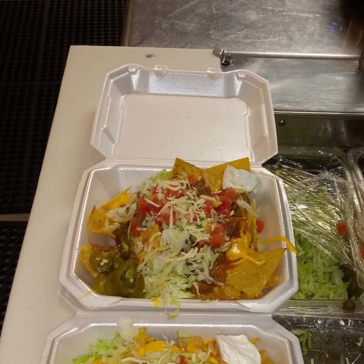 Pork and Chicken Nacho Supreme