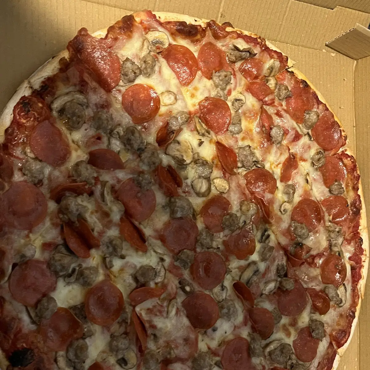 Cheese Sausage Pepperoni Mushroom Pizza