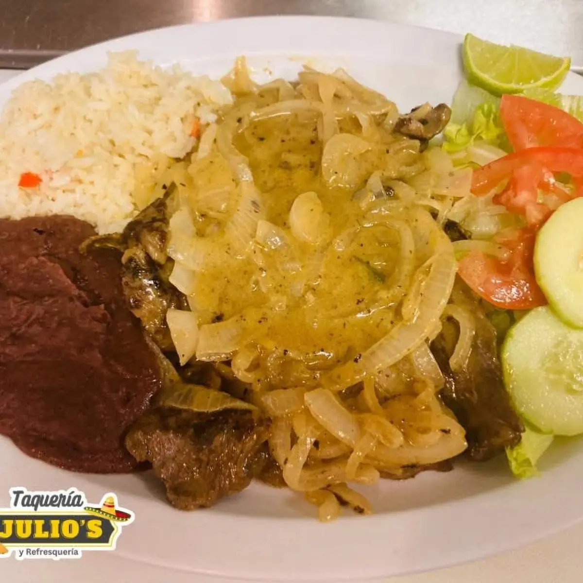 Bistec Encebollado Steak with Onions