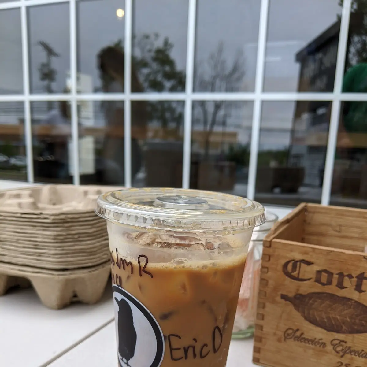 Empty Cup- Nola Coffee-Light Ice Less Milk