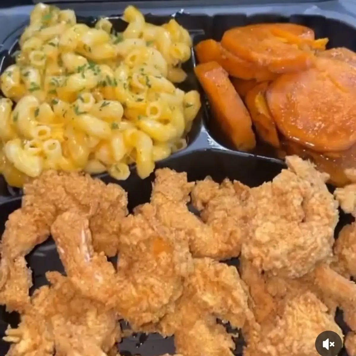 Pork Chop Dinner Two Pork Chops Fried Sides Macaroni and Cheese and Macaroni Salad with Cornbread