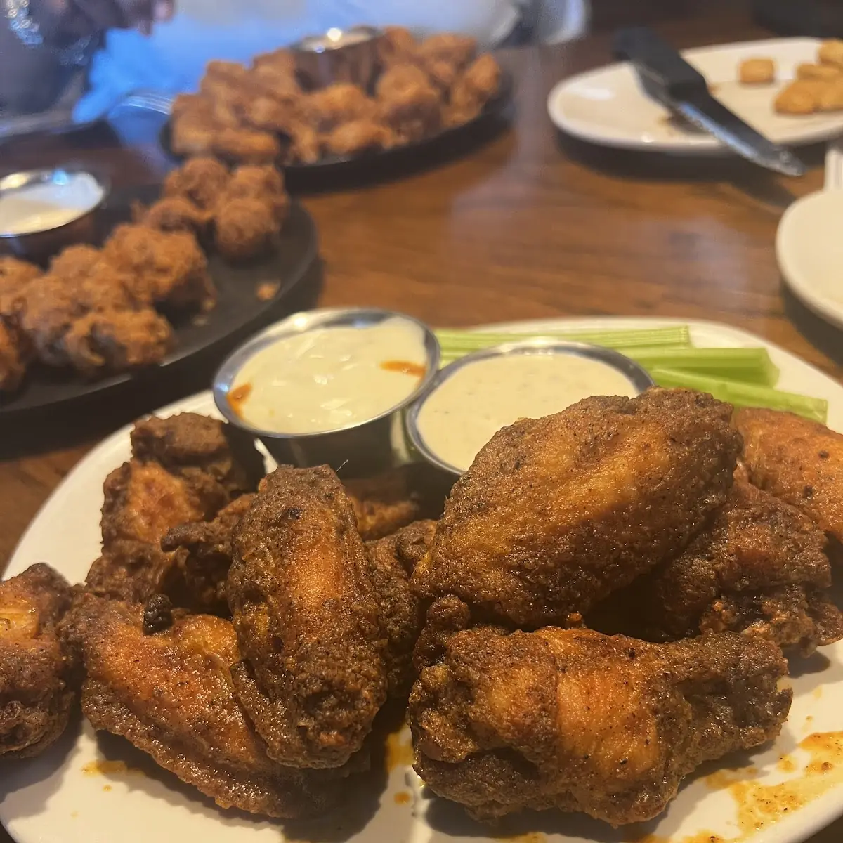 Chicken Wings with Celery Sticks and Ranch Dressing