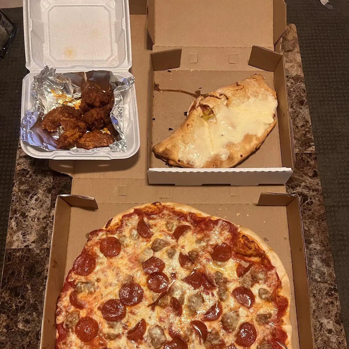 Pizza Calzone Wings and Bosco Sticks