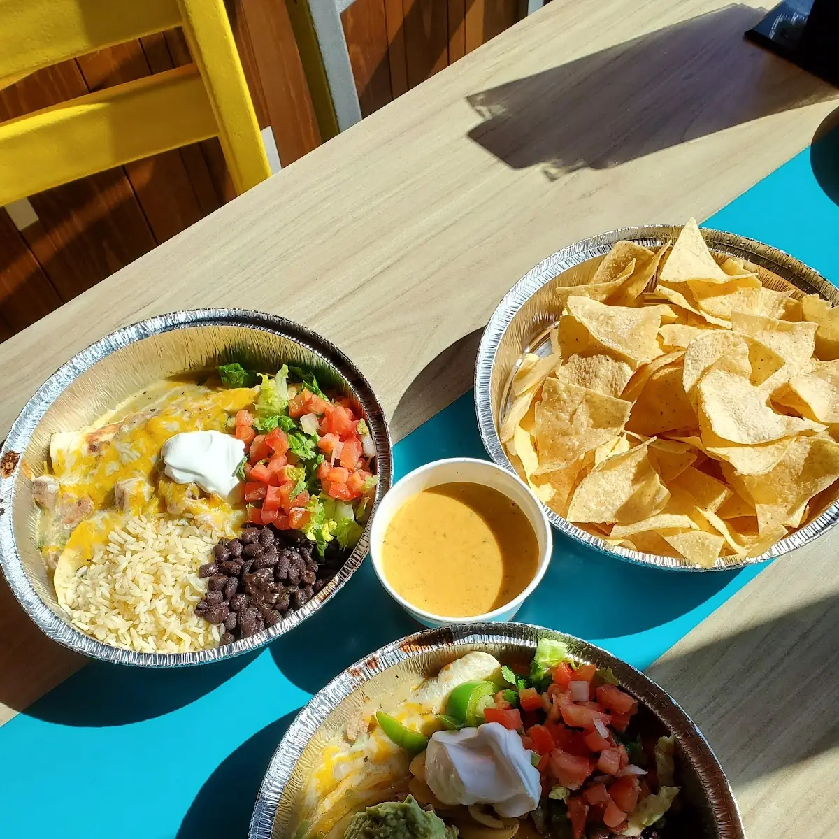 Grilled Chicken Burrito and Chips and Queso