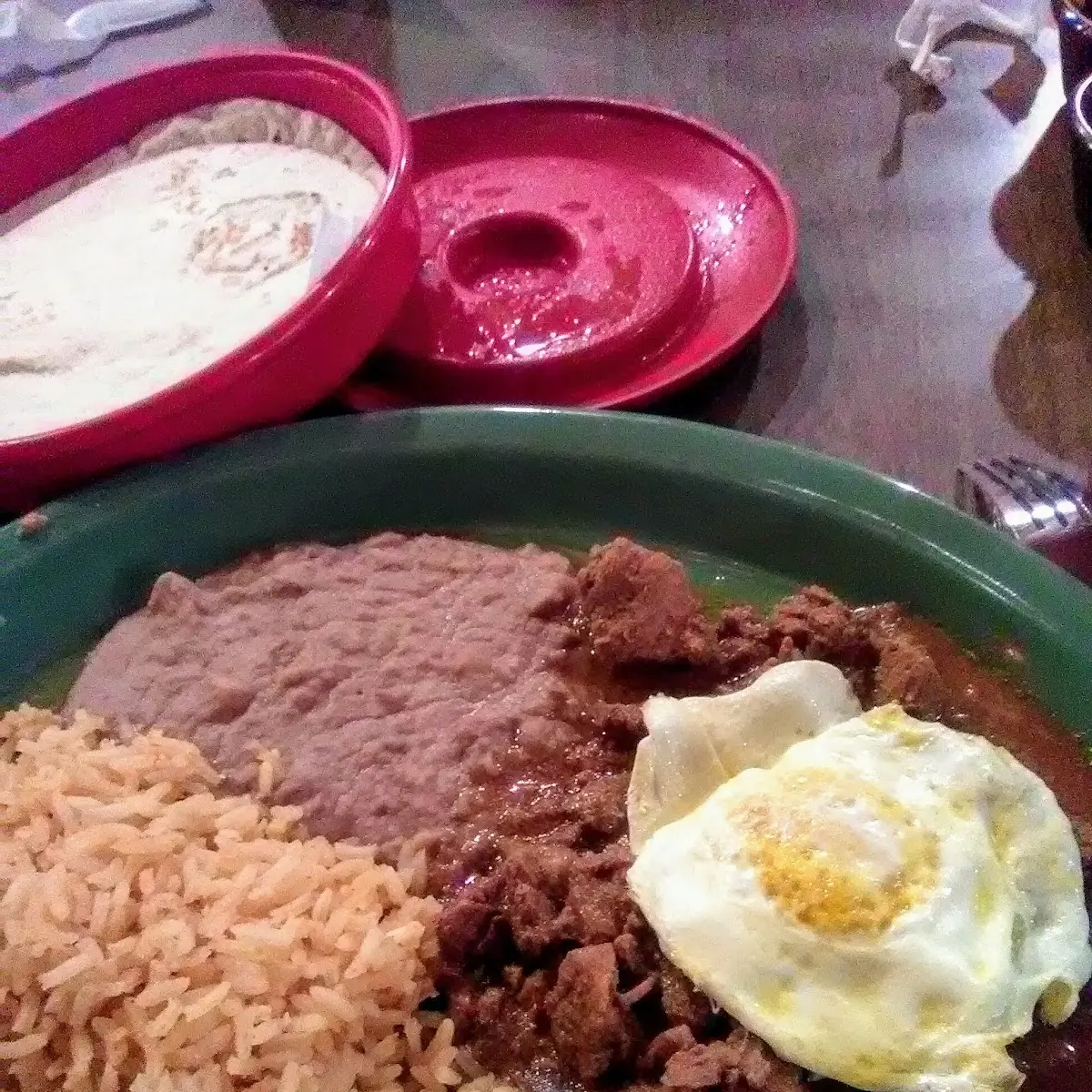 Carne Guisada Plate with an Egg