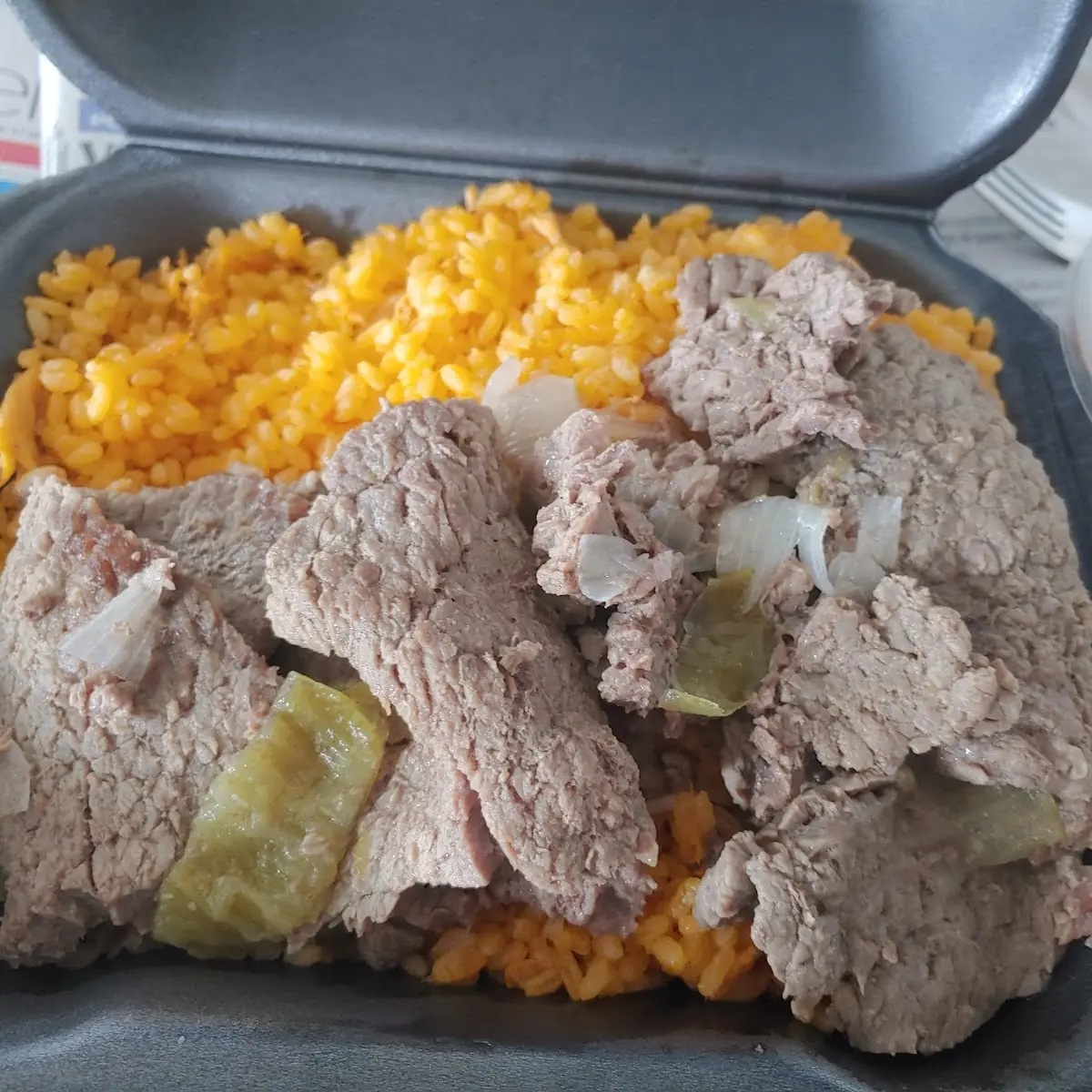 Arroz Con Bistec Encebollado