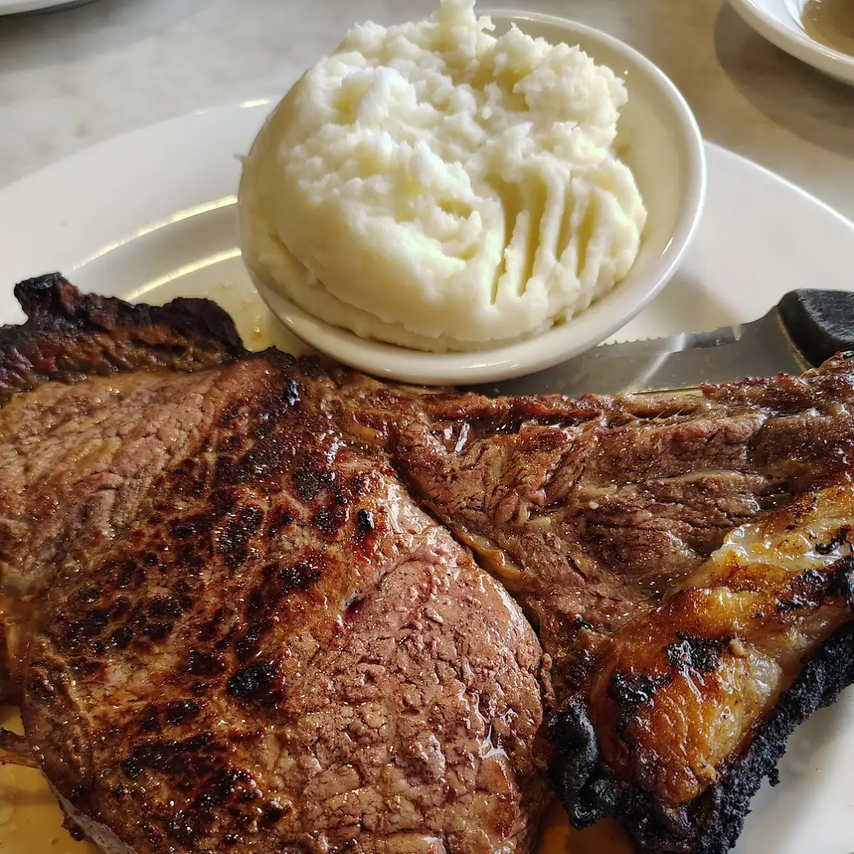8 Oz New York Strip Steak & Eggs